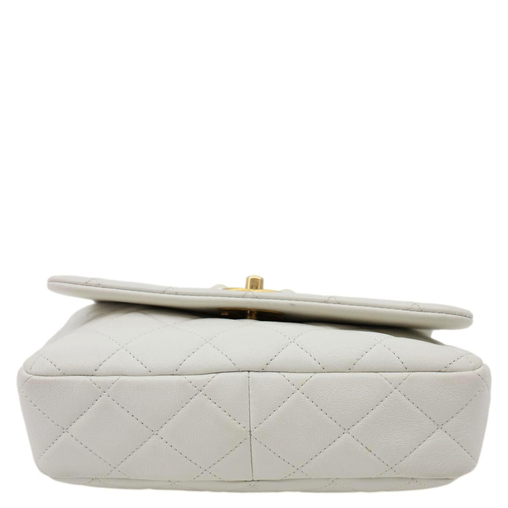 CHANEL Pearl Side Flap Quilted Leather Crossbody Bag White